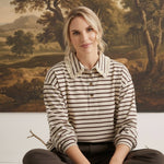 graced Tracy striped polo top with lace collar and cuffs worn by a model in a studio setting