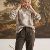 graced Tracy striped polo top with lace collar and cuffs worn by a model in a studio setting