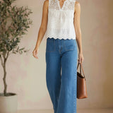 White sleeveless eyelet lace tank top by Lovestitch, featuring breathable cotton fabric and delicate eyelet detailing.