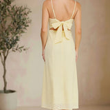 Yellow eyelet tie-back midi dress by Allie Rose, featuring a flattering silhouette and intricate eyelet detailing.