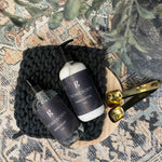 Graced Homebody hand lotion from Bath + Body collection, featuring a sleek mini bottle and soothing skincare formula.