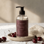Graced Door County Cherry hand soap in an 8 oz bottle, part of bath and body lotions collection, with a cherry scent and elegant label.