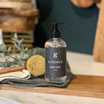 Graced Kindred hand soap in a pump bottle, featuring a creamy formula and elegant packaging for daily hand cleansing.