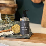 Graced Kindred hand soap in a pump bottle, featuring a creamy formula and elegant packaging for daily hand cleansing.