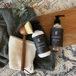 Mini Graced Kindred Hand Lotion from the Bath + Body lotion collection, featuring a sleek bottle and soothing formula.