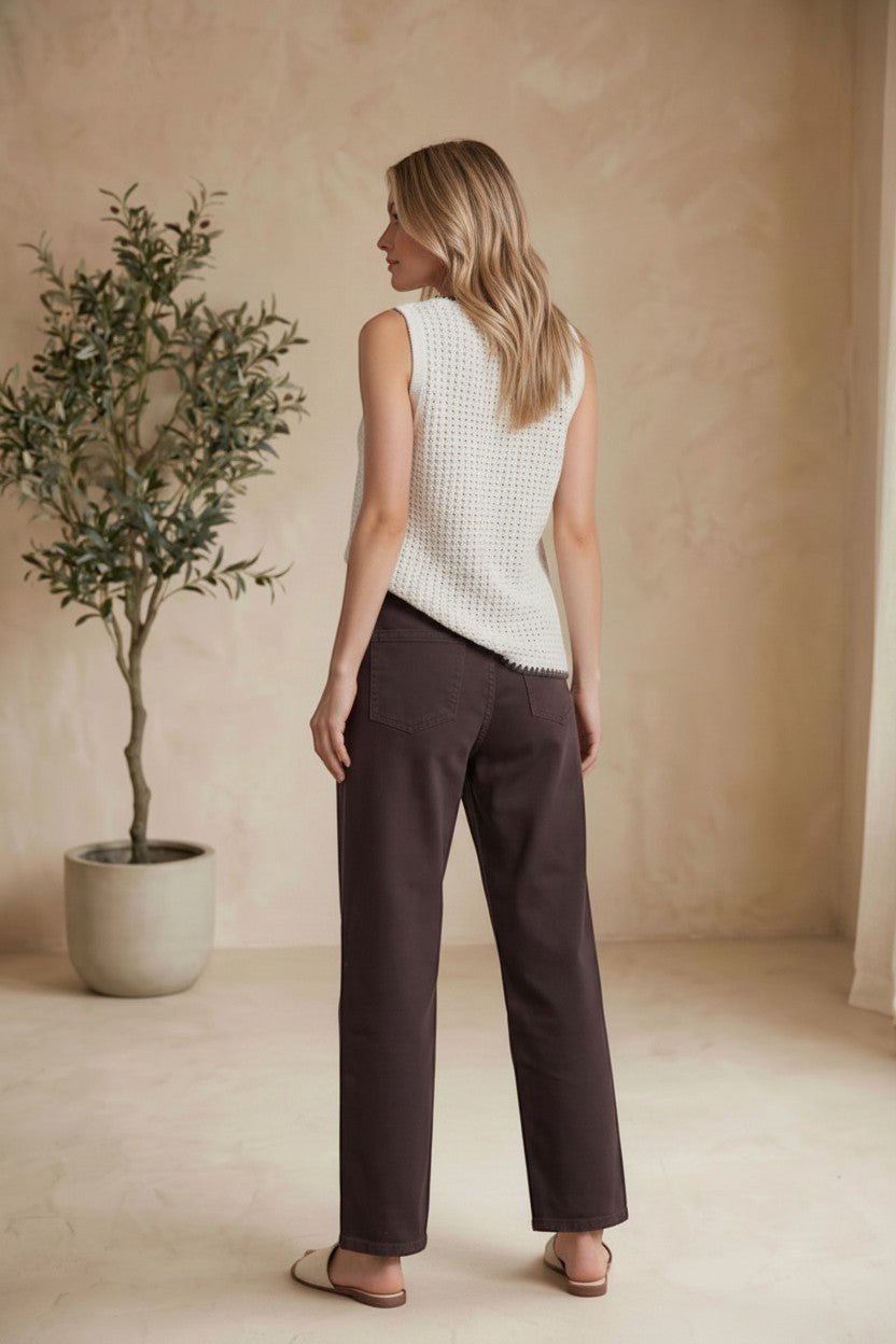Brown Miou Muse high-rise straight jeans, stylish bottoms with a classic fit, shown on a model.