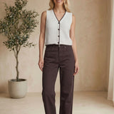 Brown high rise straight jeans by Miou Muse, showcasing a stylish fit and classic denim design.