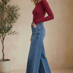 Vervet high rise wide-leg jeans, stylish bottoms pants with a relaxed fit and classic denim look, showcased on a model.