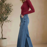 Vervet high rise wide-leg jeans, stylish bottoms pants with a relaxed fit and classic denim look, showcased on a model.