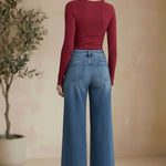 Vervet high-rise wide-leg jeans featuring a classic denim look, fitted waist, and flowing pant legs for a stylish, comfortable fit.