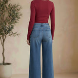 Vervet high-rise wide-leg jeans featuring a classic denim look, fitted waist, and flowing pant legs for a stylish, comfortable fit.