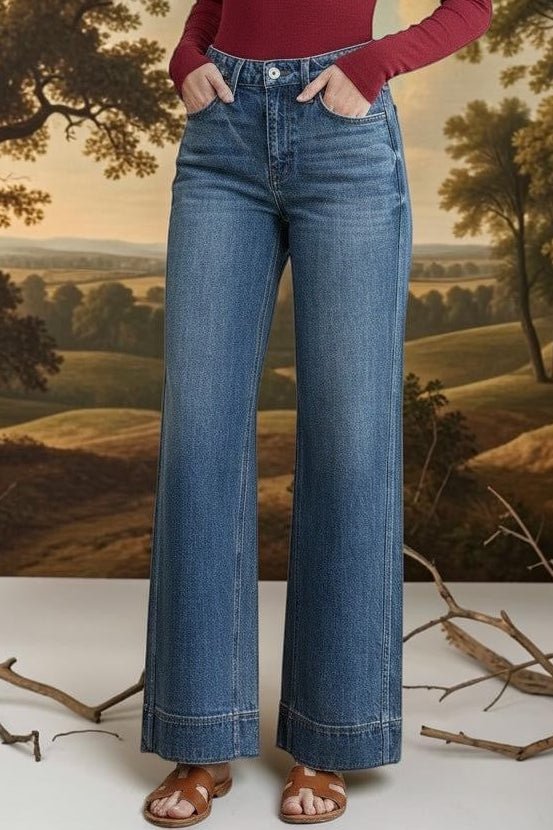 Vervet high-rise wide-leg jeans, stylish bottoms with a relaxed fit, visible in a full-length shot on a plain background.