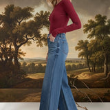 Vervet high rise wide-leg jeans, stylish bottoms pants with a relaxed fit and classic denim look, showcased on a model.