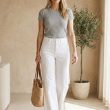 Vervet high rise wide leg white jeans, stylish bottoms pants with a relaxed fit and clean white denim appearance.