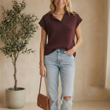 Chocolate split neck sleeveless sweater by in february, featuring a basic top design in a stylish sleeveless cut.