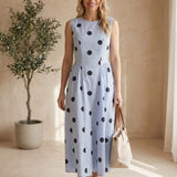 Klesis sleeveless polka dot midi dress on virtual model, showing classic pattern and elegant silhouette.