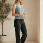 Be Cool knit V-neck tank top in denim, displayed on a model, featuring a fitted sleeveless design with a V neckline.