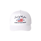 White cap with 'Land of the free Home of the Brave' text and American flag on a white background