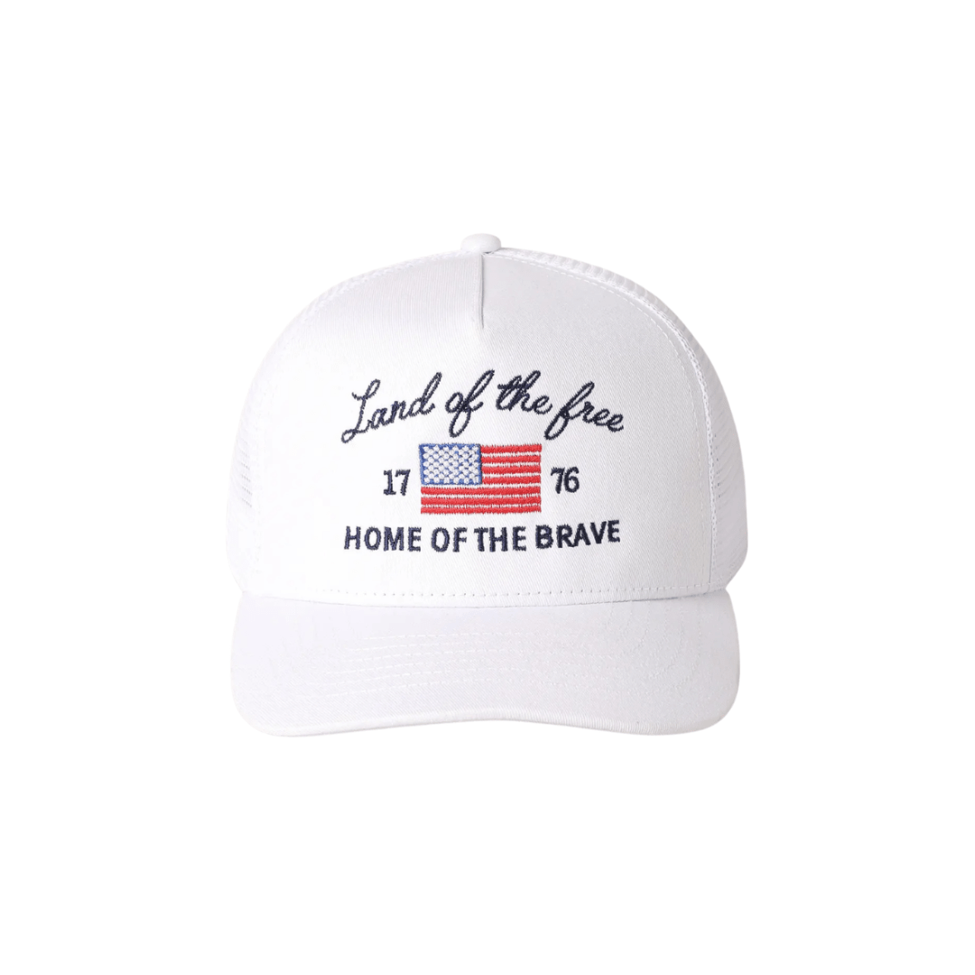 White cap with 'Land of the free Home of the Brave' text and American flag on a white background