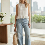 White &Merci shirred button-down blouse with long sleeves and a relaxed fit, styled on a model.