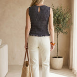 Grey cotton Ruffle Detail Top by Miou Muse featuring smocked fabric and feminine ruffle accents.