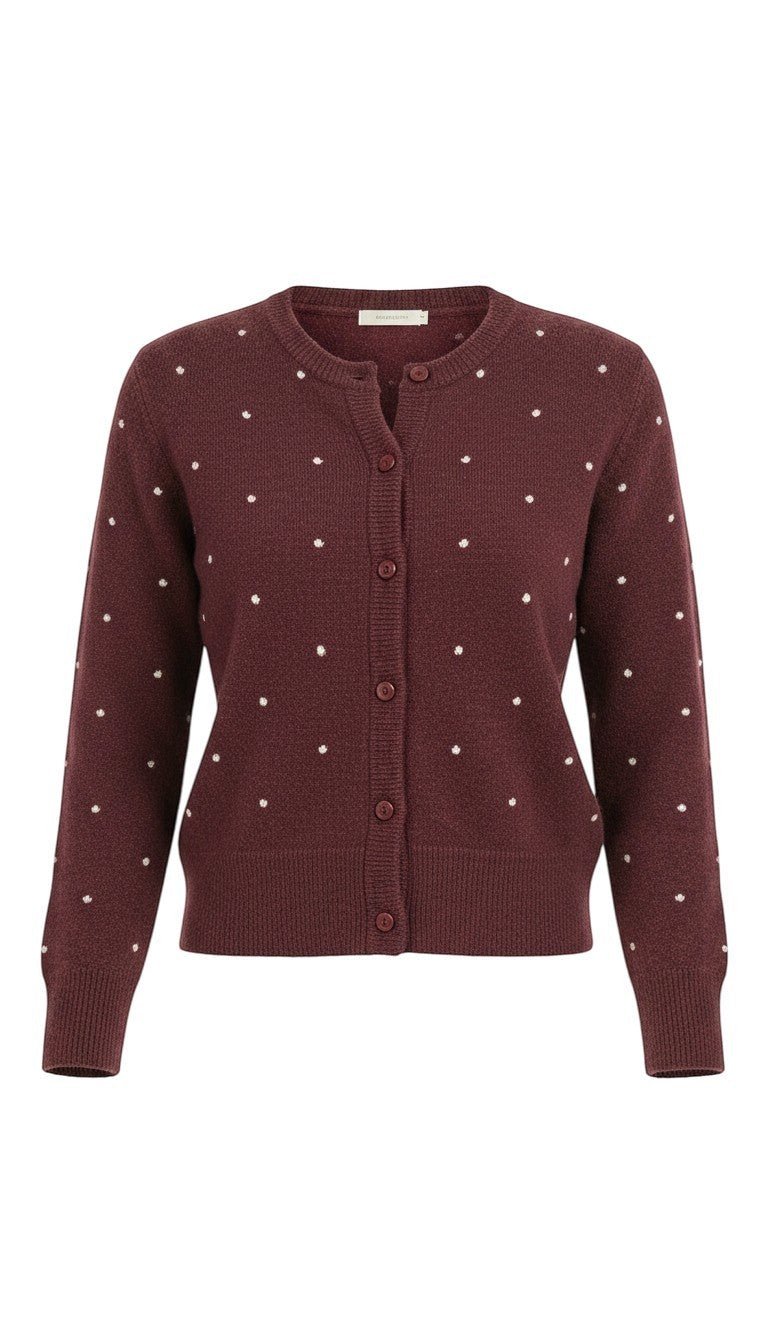 graced burgundy cardigan with raised white polka dots, featuring a button-up front and ribbed cuffs in a wool blend.