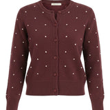 graced burgundy cardigan with raised white polka dots, featuring a button-up front and ribbed cuffs in a wool blend.