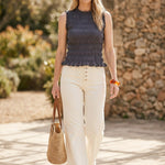 Navy ruffle detail top by Miou Muse, a stylish basic blouse with feminine ruffle accents and a relaxed fit.