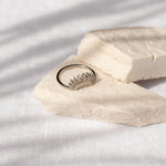 Silver Sahara Ring by ALCO, a stylish jewelry accessory featuring a sleek silver band with intricate design details.