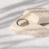 Silver Sahara Ring by ALCO, a stylish jewelry accessory featuring a sleek silver band with intricate design details.