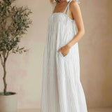 Striped Lovestitch shirred tie-shoulder maxi dress with flowing silhouette and adjustable straps, perfect for warm weather.