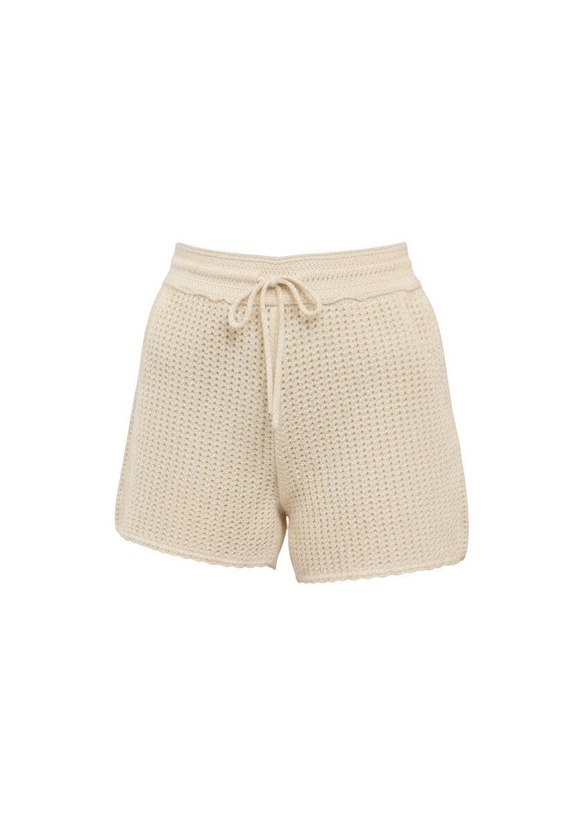 Ivory crochet shorts from Skies are Blue called The Annie, featuring a stylish, textured knit design, perfect for casual summer wear.