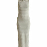 Olive and off-white sleeveless boat neck midi dress by Active Basic, displayed on a model.