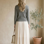 Off-white Be Cool smocked waist midi skirt, stylish bottoms with a relaxed fit and gathered waistband, perfect for casual wear.