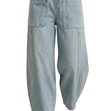 graced light wash denim barrel pants with a relaxed fit, elastic drawstring waist, and large front patch pockets.