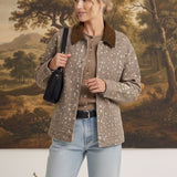 graced Alyssa jacket in beige animal print with a brown corduroy collar worn by a model with light blue jeans