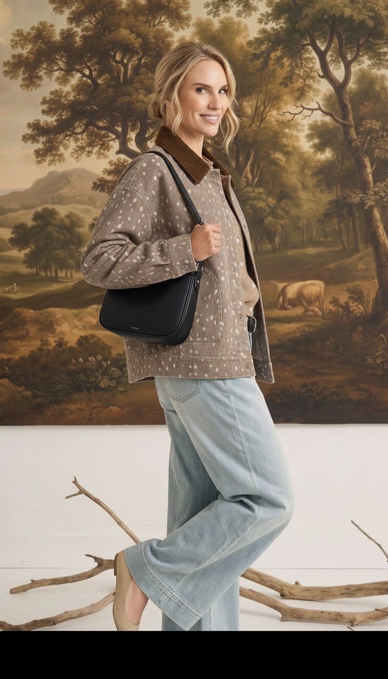 graced Alyssa animal print cotton jacket with a brown corduroy collar worn by a woman with a black shoulder bag
