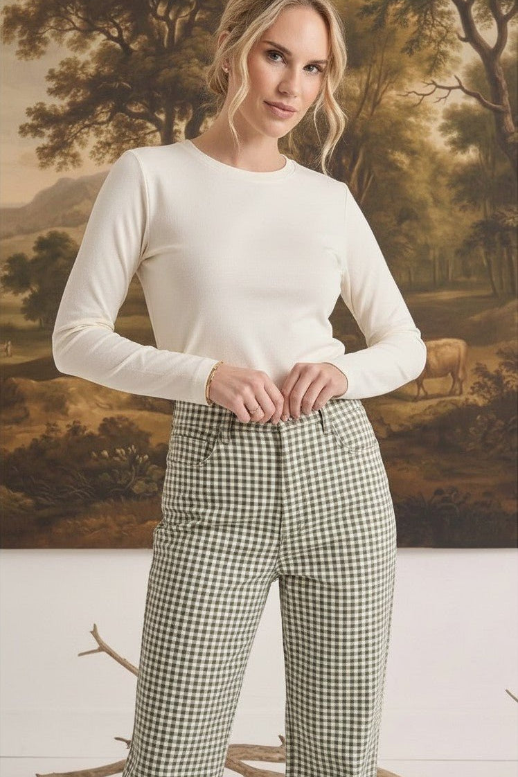Model wearing graced Alyssa Gingham Barrel Pants in green and white cotton blend with a relaxed silhouette