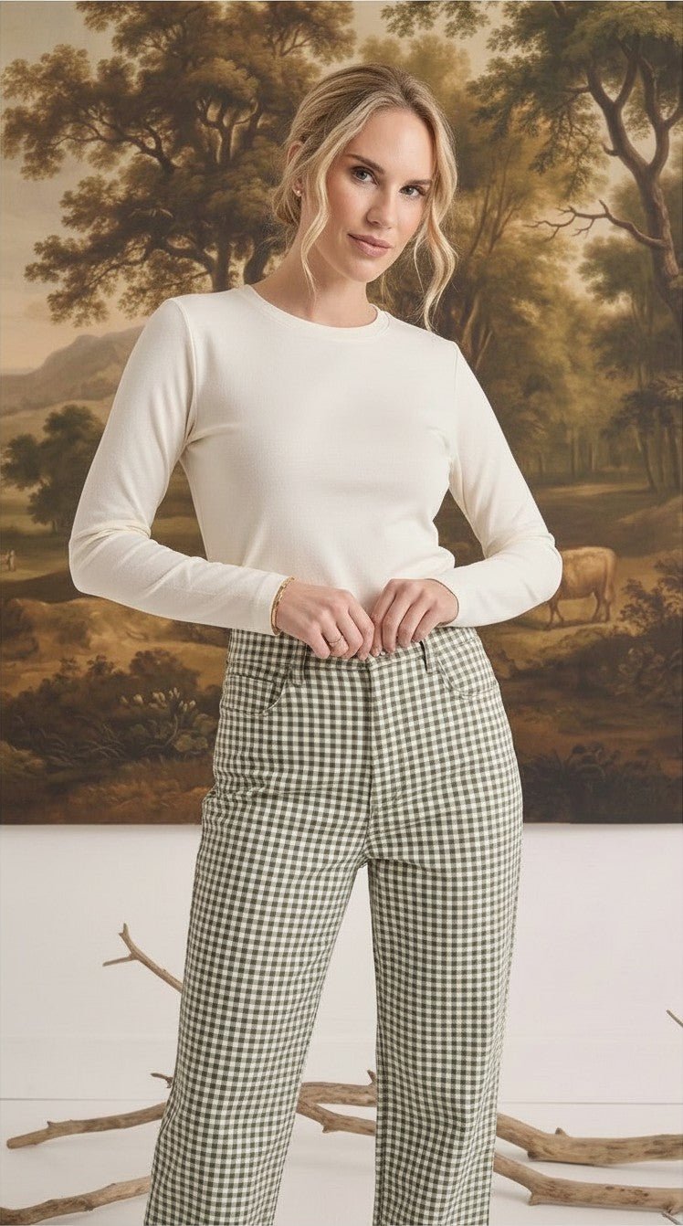 Model wearing graced Alyssa Gingham Barrel Pants in green and white cotton blend with a relaxed silhouette