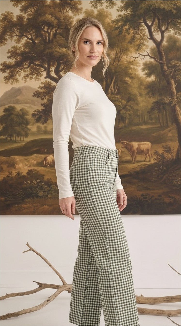 Model wearing graced Alyssa Gingham Barrel Pants in green and white cotton blend with a relaxed silhouette
