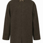 Espresso-colored Anna Five Button Coat by graced, stylish outerwear with five button detail, worn by a model outdoors.