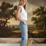 graced Blaine high rise straight leg jeans in light blue denim worn by a woman with a white sleeveless top