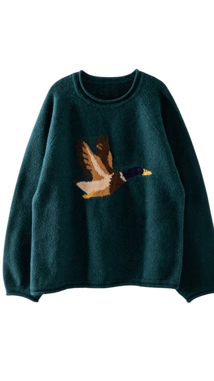 graced Carley Mallard sweater in forest green featuring a flying duck knit design and cozy crew neck fit