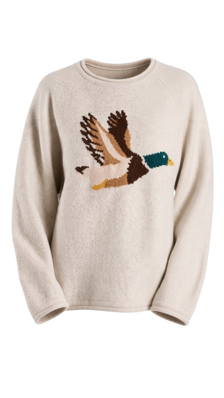 graced Carley Mallard sweater in oatmeal featuring a flying mallard duck intarsia knit design and crew neckline