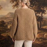 graced Chloe chunky knit cardigan in olive worn by a model, back view showing textured acrylic fabric and relaxed fit