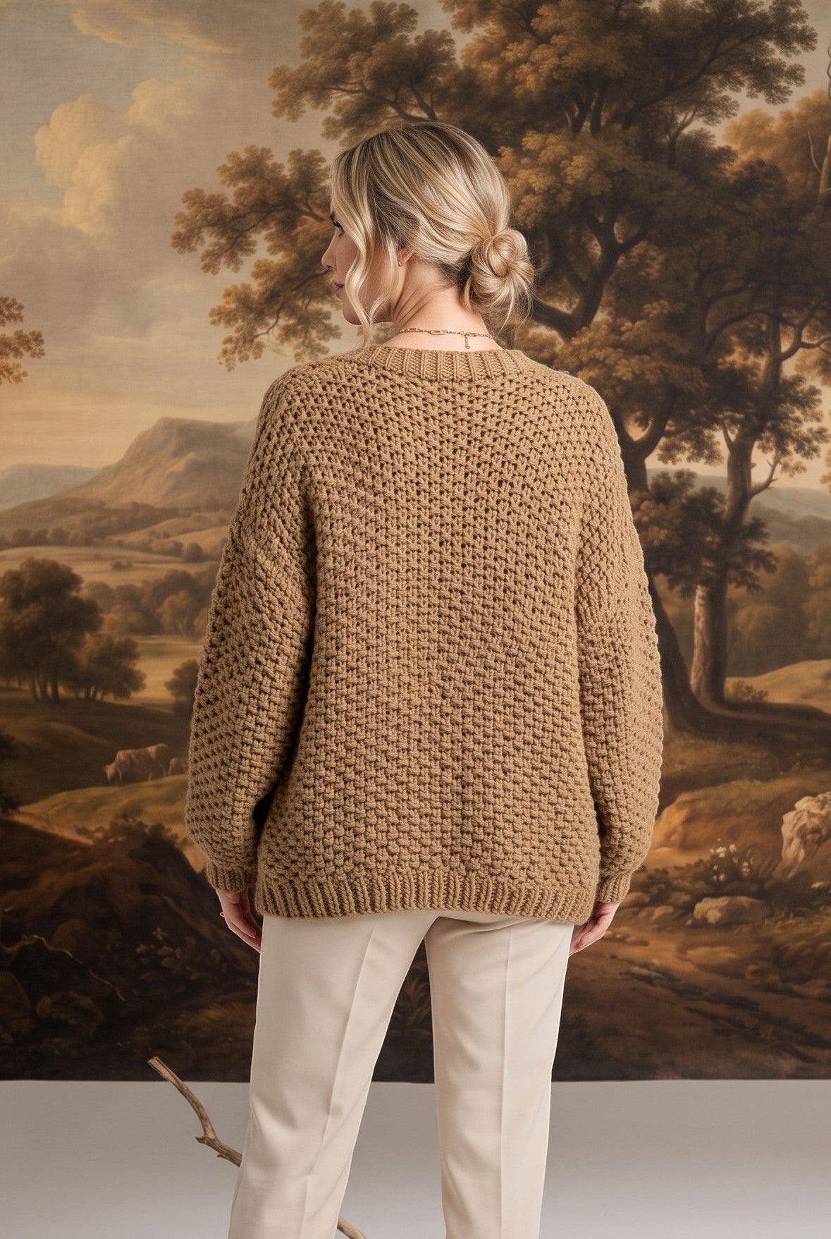 graced Chloe chunky knit cardigan in olive worn by a model, back view showing textured acrylic fabric and relaxed fit