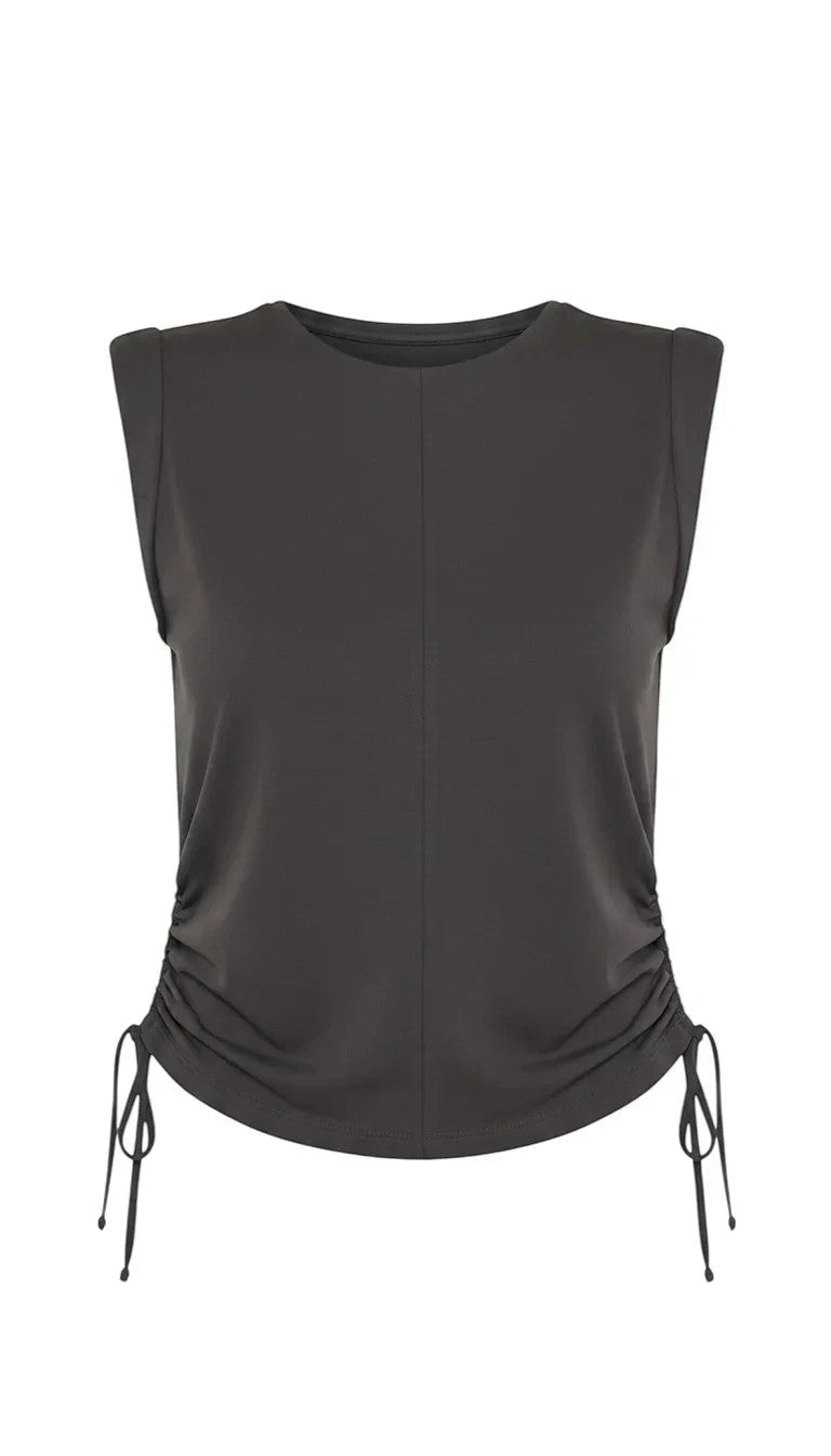 graced chocolate brown sleeveless cotton top with side tie cinching detail and a crew neckline