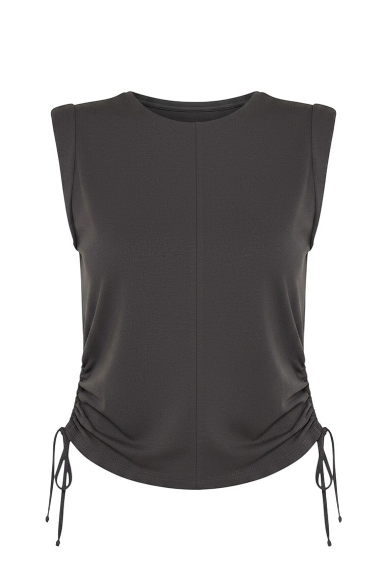 graced chocolate brown cotton sleeveless top with side tie cinch detail and a round neckline