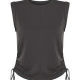 graced chocolate brown sleeveless cotton top with side tie cinching detail and a crew neckline