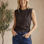 graced chocolate brown sleeveless cotton top with side tie detail worn by a smiling blonde model